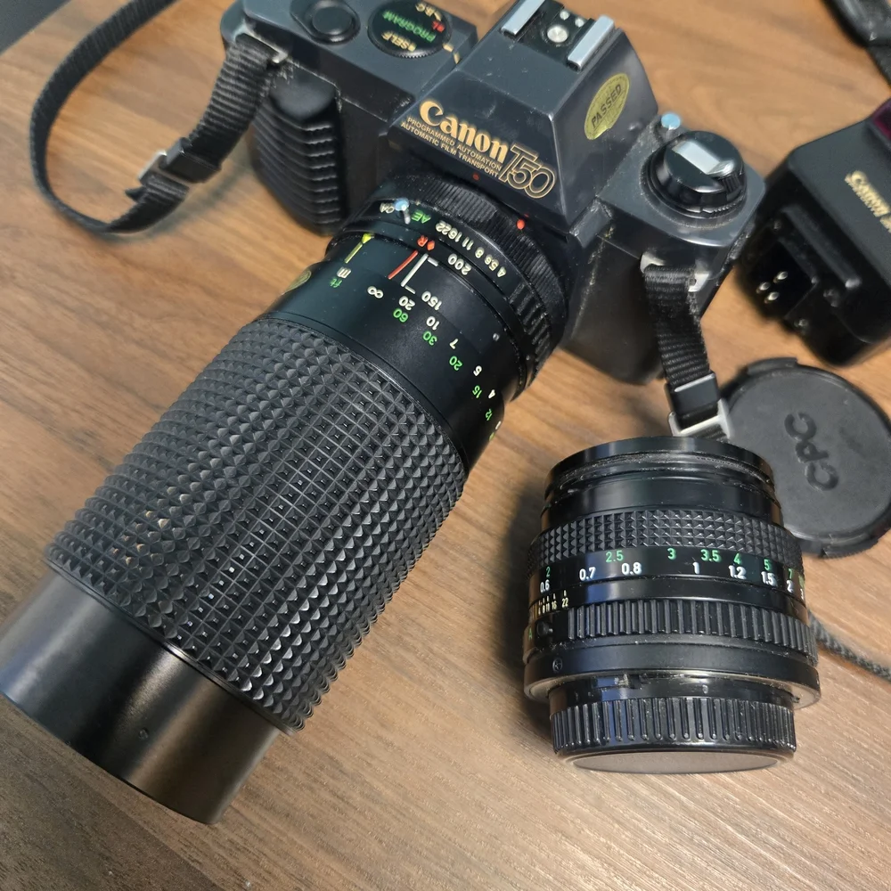 Canon Black SLR Camera with Textured Zoom Lens